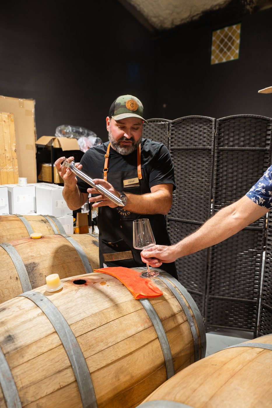 Sampling straight from the barrel in a Hill Country barrel room