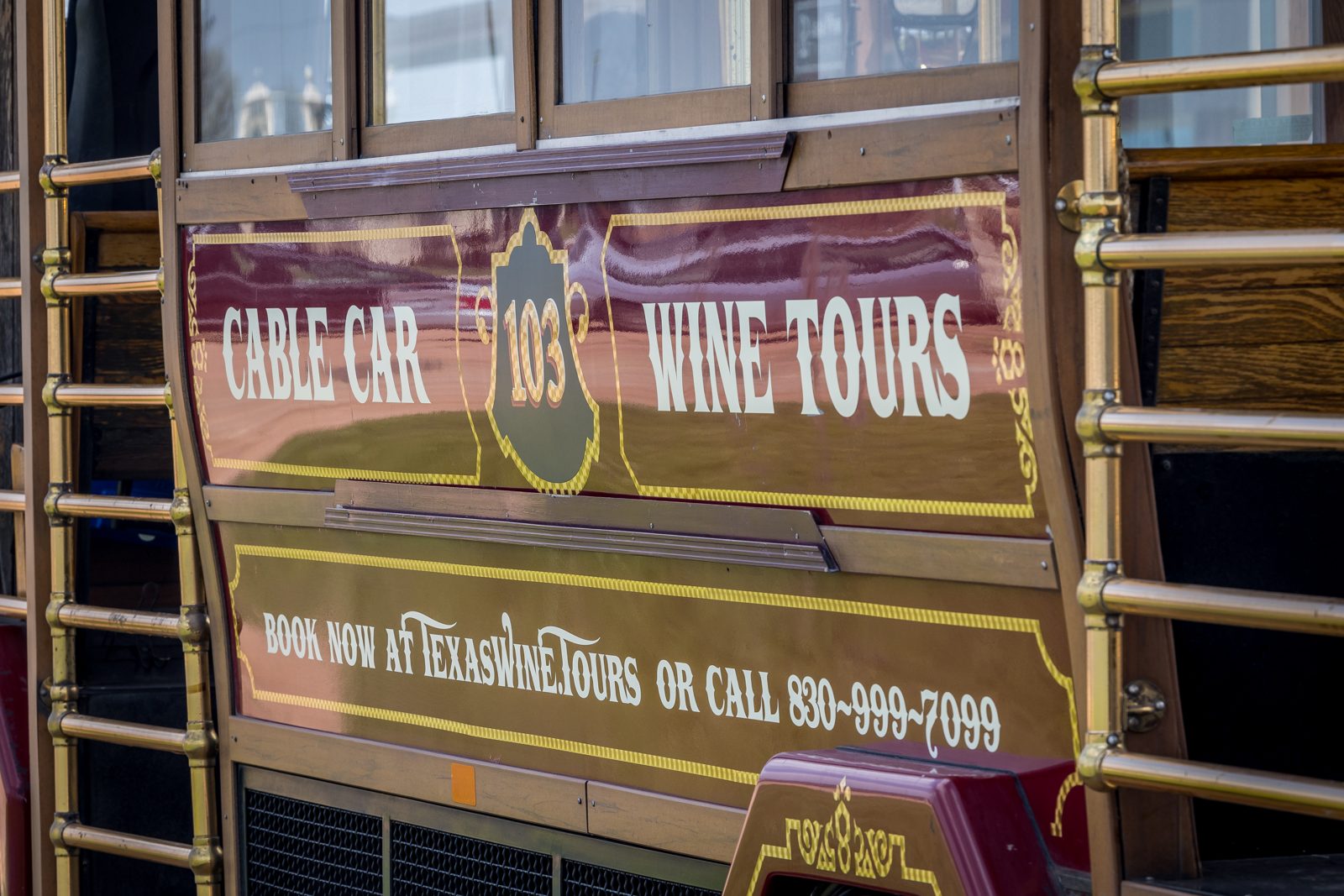 Hand-lettered Cable Car Wine Tours panel on one of our restored cable cars